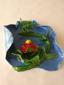 Green Vine With Flower On Bleu Sea. Won-Ldy Paye. Ceramic. 2017. USA. Liberian Art.