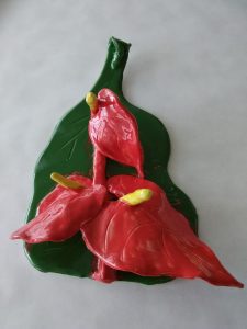 Red African Flamingo Flower On Green Leave. Won-Ldy Paye. Ceramic. 2017. USA. Liberian Art.